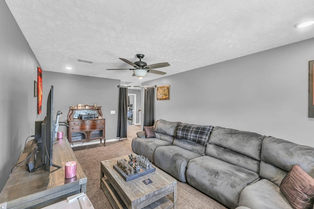 911 Keepsake Diamond Ln, Murfreesboro, TN 37128 - living room featuring carpet flooring, a ceiling fan, a textured ceiling, and baseboards