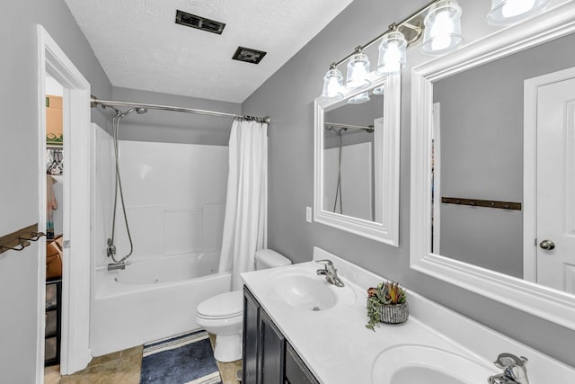 911 Keepsake Diamond Ln, Murfreesboro, TN 37128 - full bath with shower / bath combo, toilet, double vanity, a textured ceiling, and tile patterned floors