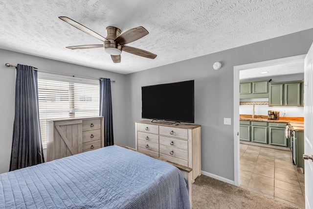911 Keepsake Diamond Ln, Murfreesboro, TN 37128 - bedroom featuring baseboards, a ceiling fan, a textured ceiling, and a sink