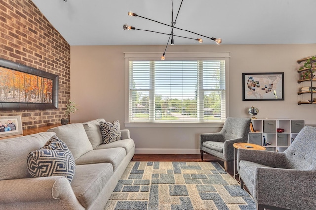 6416 Edsel Dr, Nashville, TN 37209 - living room featuring baseboards, wood finished floors, and lofted ceiling