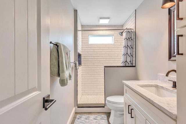 6416 Edsel Dr, Nashville, TN 37209 - bathroom featuring vanity, toilet, and tiled shower