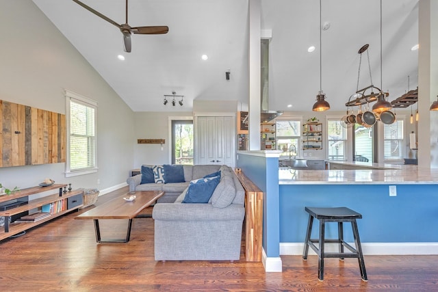 6416 Edsel Dr, Nashville, TN 37209 - living area with high vaulted ceiling, a ceiling fan, wood finished floors, baseboards, and recessed lighting