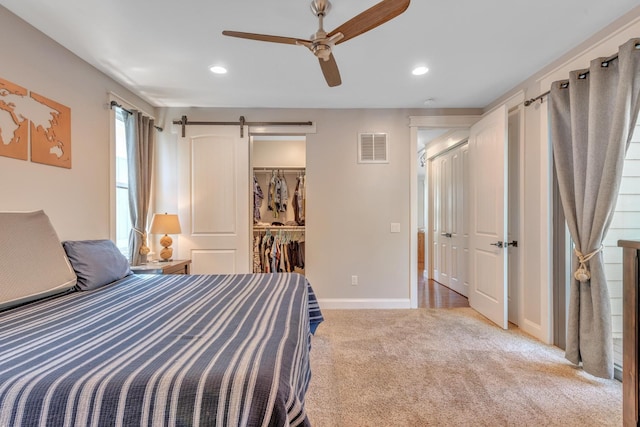 6416 Edsel Dr, Nashville, TN 37209 - bedroom featuring carpet, baseboards, a spacious closet, recessed lighting, and a barn door