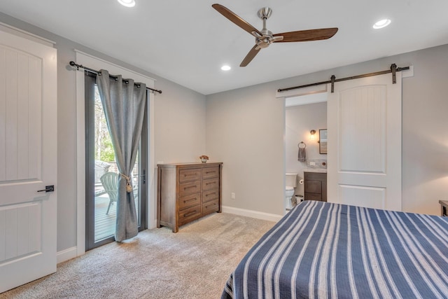 6416 Edsel Dr, Nashville, TN 37209 - bedroom featuring a barn door, light carpet, recessed lighting, baseboards, and access to exterior
