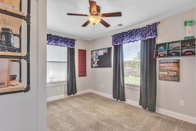 6416 Edsel Dr, Nashville, TN 37209 - empty room with a ceiling fan, carpet flooring, and plenty of natural light