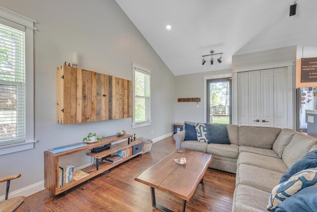 6416 Edsel Dr, Nashville, TN 37209 - living room with lofted ceiling, wood finished floors, and baseboards