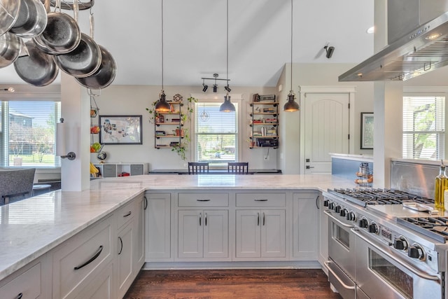 6416 Edsel Dr, Nashville, TN 37209 - kitchen featuring island range hood, range with two ovens, healthy amount of natural light, and light stone countertops