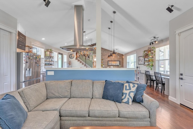 6416 Edsel Dr, Nashville, TN 37209 - living area featuring wood finished floors, stairs, and recessed lighting