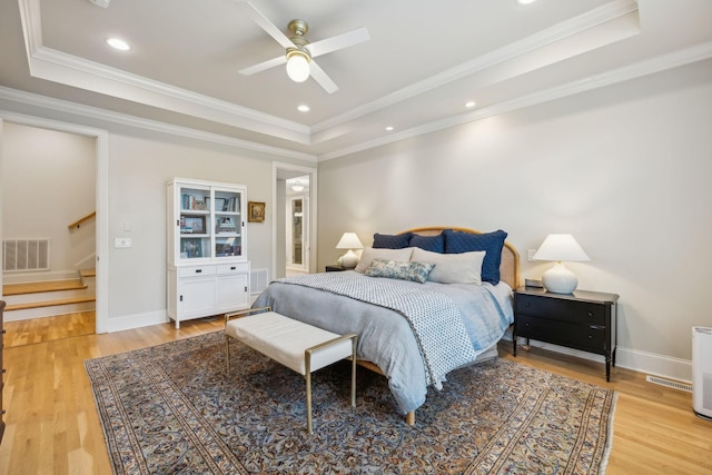 4083 Kings Camp Pass, Arrington, TN 37014 - bedroom featuring a raised ceiling, light wood finished floors, ornamental molding, recessed lighting, and a ceiling fan