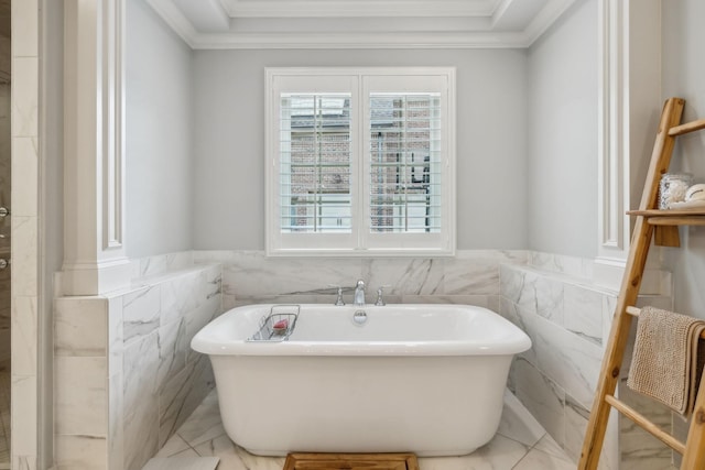 4083 Kings Camp Pass, Arrington, TN 37014 - bathroom with crown molding, a soaking tub, tile walls, and a wainscoted wall