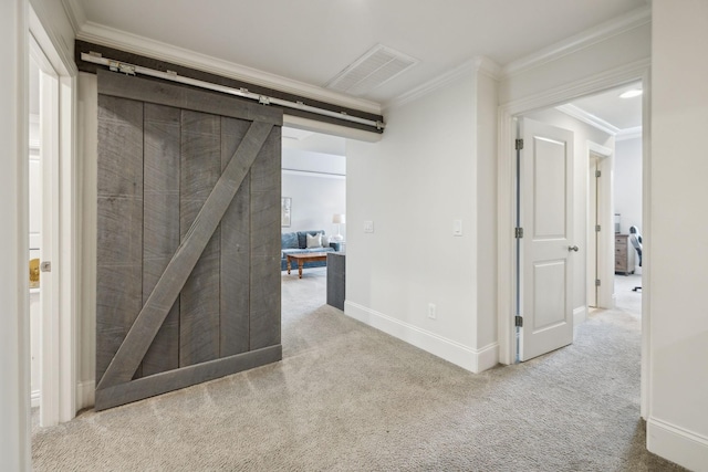 4083 Kings Camp Pass, Arrington, TN 37014 - hall with carpet floors, crown molding, baseboards, and a barn door