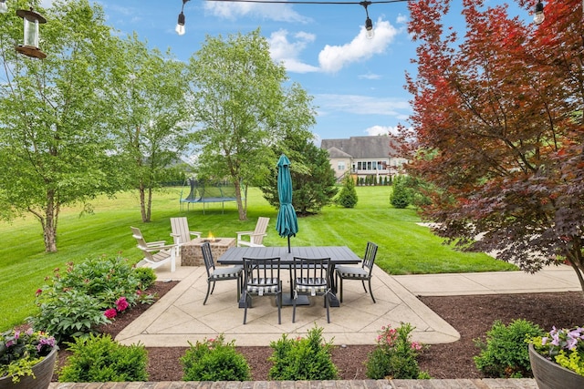 4083 Kings Camp Pass, Arrington, TN 37014 - view of patio with a trampoline and outdoor dining space