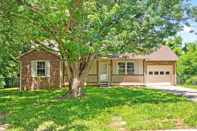 105 Iris Ct, Clarksville, TN 37042 - view of front of home featuring brick siding, a garage, driveway, a porch, and roof with shingles