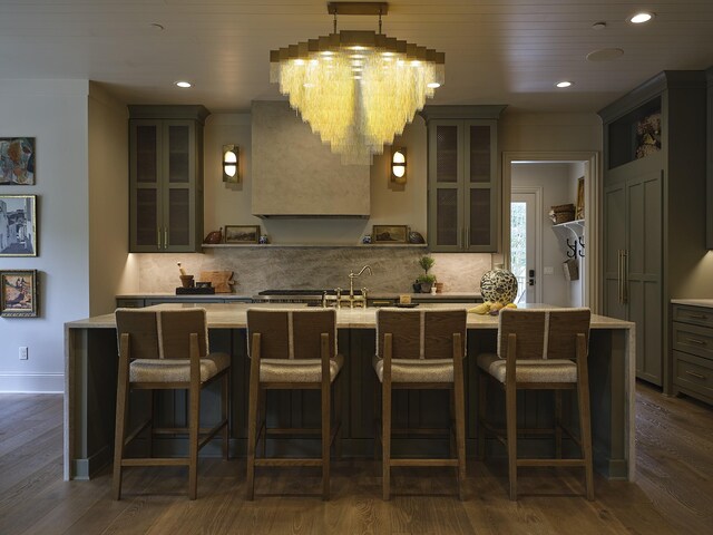 4516 Shys Hill Rd, Nashville, TN 37215 - kitchen featuring light countertops, decorative backsplash, dark wood-type flooring, and recessed lighting