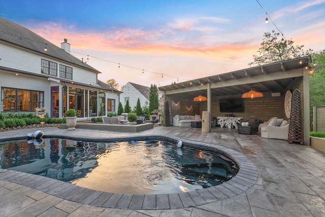 4516 Shys Hill Rd, Nashville, TN 37215 - outdoor pool featuring outdoor lounge area, a patio area, and a sunroom