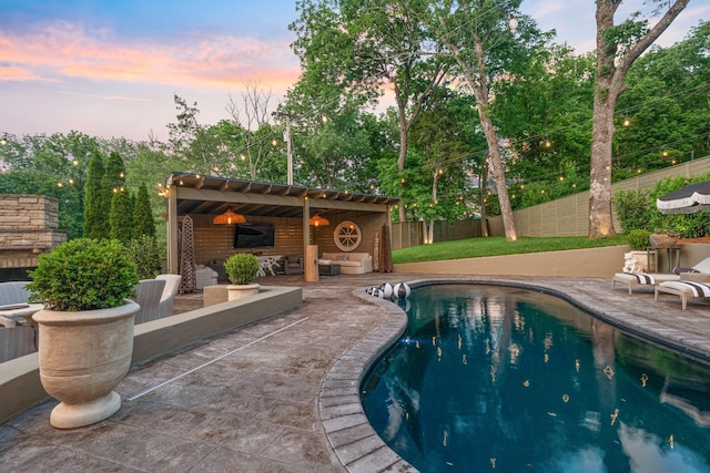 4516 Shys Hill Rd, Nashville, TN 37215 - pool at dusk with a patio area and a fenced backyard
