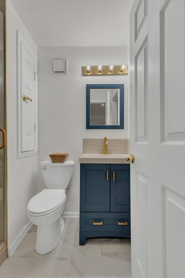 235 Glenstone Cir, Brentwood, TN 37027 - full bath with vanity, toilet, baseboards, and a stall shower