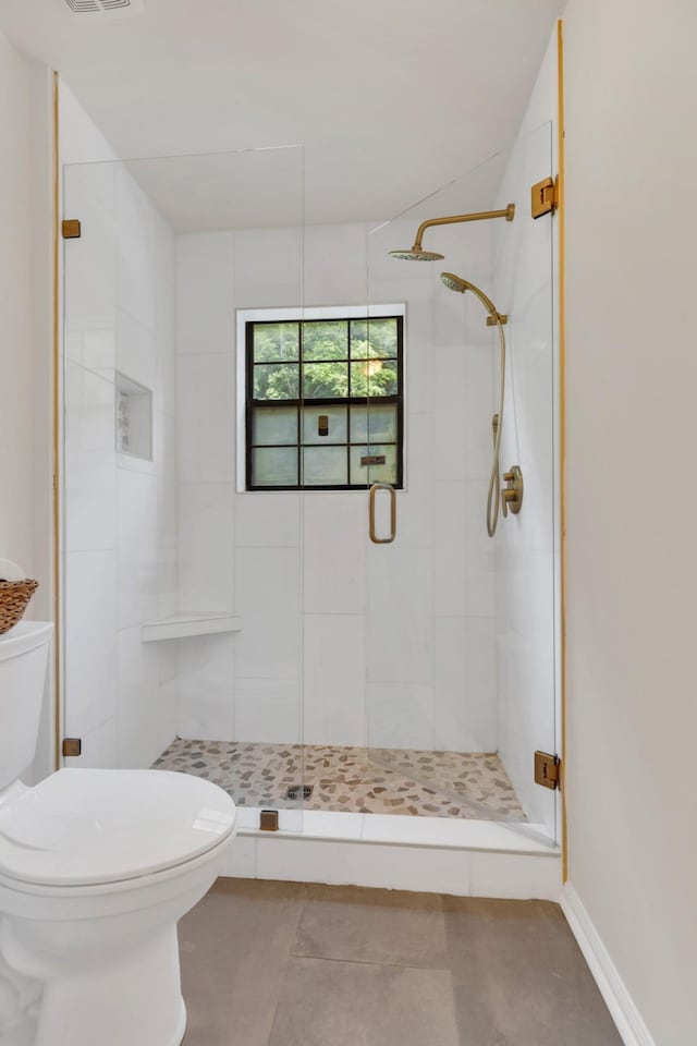 235 Glenstone Cir, Brentwood, TN 37027 - bathroom with toilet, a stall shower, and tile patterned floors