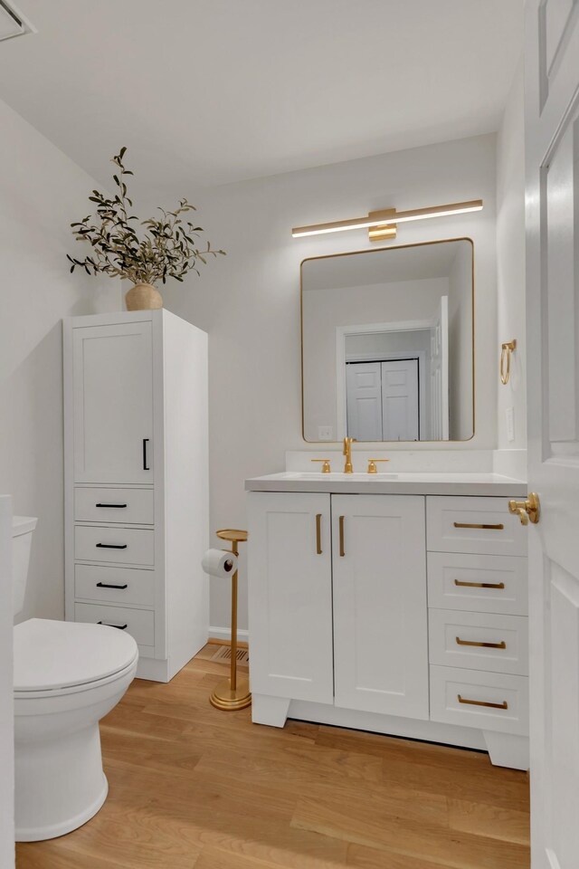 235 Glenstone Cir, Brentwood, TN 37027 - bathroom featuring vanity, toilet, and wood finished floors