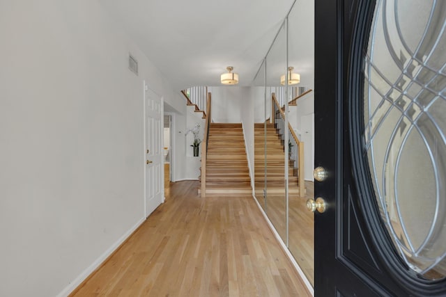 235 Glenstone Cir, Brentwood, TN 37027 - entrance foyer featuring light wood finished floors, baseboards, and stairway