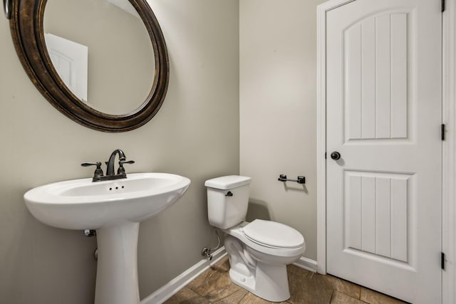 3296 Wiser Dr, Clarksville, TN 37042 - half bathroom featuring baseboards and toilet