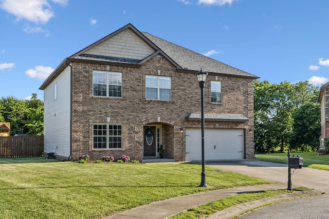 3296 Wiser Dr, Clarksville, TN 37042 - view of front of property featuring driveway, a garage, and brick siding
