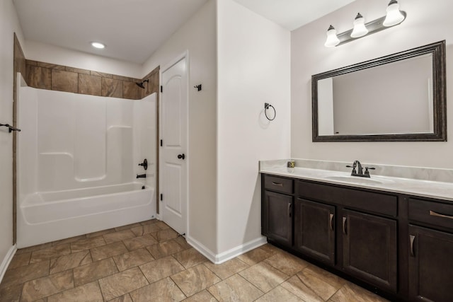 3296 Wiser Dr, Clarksville, TN 37042 - full bathroom with vanity, shower / washtub combination, stone finish floors, and recessed lighting