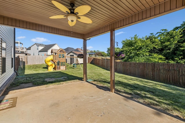 3296 Wiser Dr, Clarksville, TN 37042 - fenced backyard featuring a playground, a patio area, ceiling fan, and a residential view