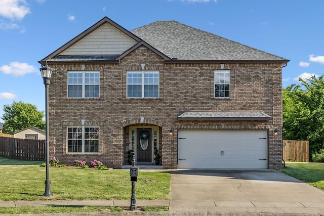 3296 Wiser Dr, Clarksville, TN 37042 - view of front facade with a garage, driveway, brick siding, and roof with shingles