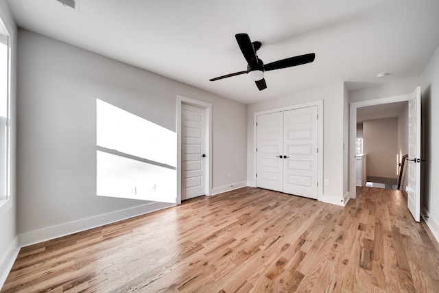 2120 Burns St, Nashville, TN 37216 - unfurnished bedroom featuring light wood-style floors, baseboards, a closet, and ceiling fan