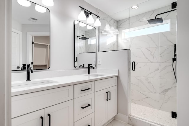 2120 Burns St, Nashville, TN 37216 - bathroom featuring a marble finish shower, double vanity, and marble finish flooring