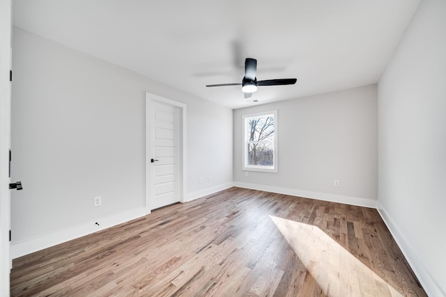 2120 Burns St, Nashville, TN 37216 - empty room with wood finished floors, ceiling fan, and baseboards