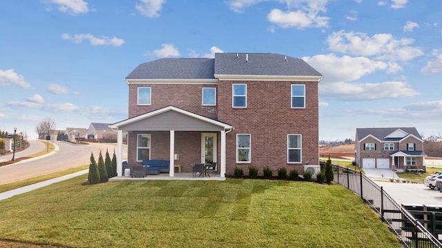800 Cawthorn Ln, Mount Juliet, TN 37122 - rear view of house with brick siding, outdoor lounge area, and a patio