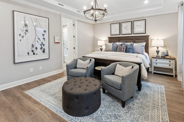 800 Cawthorn Ln, Mount Juliet, TN 37122 - bedroom with a tray ceiling, a chandelier, wood finished floors, baseboards, and recessed lighting