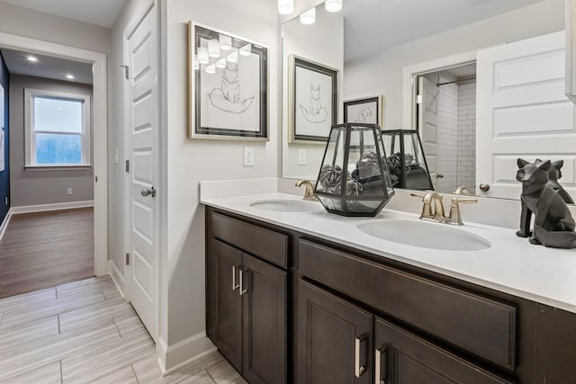 800 Cawthorn Ln, Mount Juliet, TN 37122 - full bathroom with double vanity, baseboards, wood finished floors, and recessed lighting