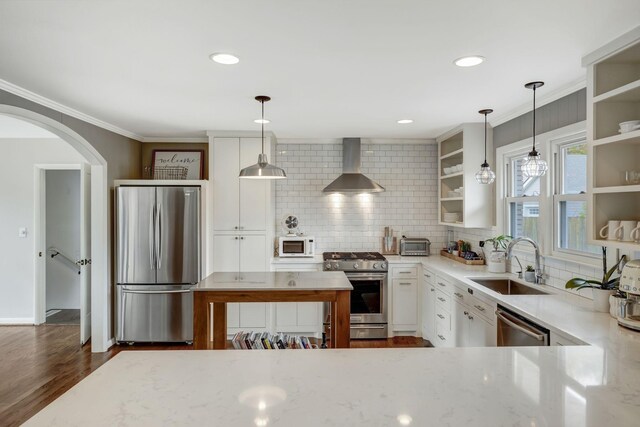 418 Boyd Mill Ave, Franklin, TN 37064 - kitchen with stainless steel appliances, wall chimney exhaust hood, open shelves, a sink, and light stone counters