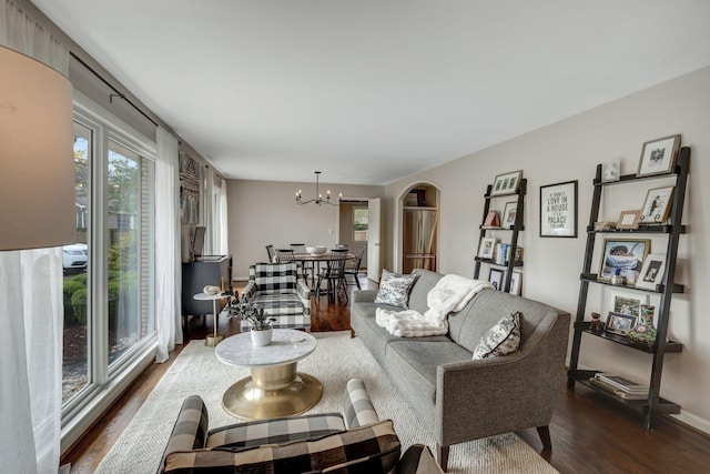 418 Boyd Mill Ave, Franklin, TN 37064 - living area with dark wood-style floors, healthy amount of natural light, and a chandelier