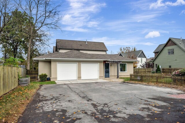 418 Boyd Mill Ave, Franklin, TN 37064 - view of front facade with an attached garage, driveway, and a shingled roof