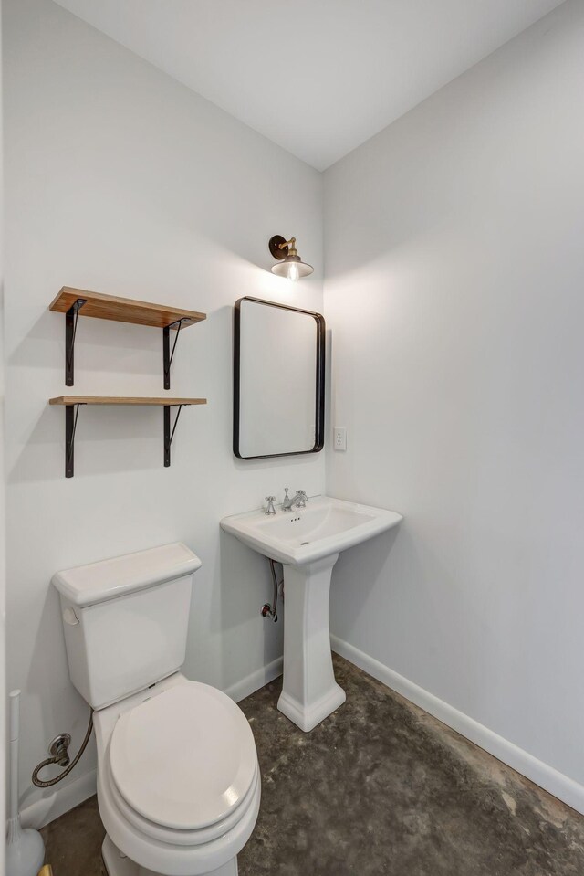 418 Boyd Mill Ave, Franklin, TN 37064 - half bathroom with toilet and baseboards