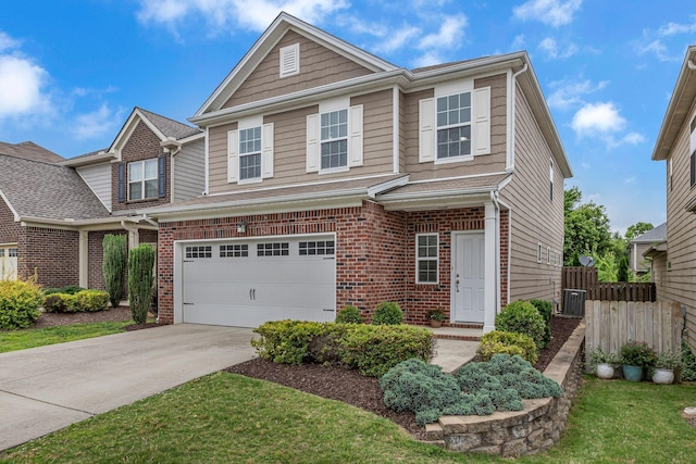 1039 Hemlock Dr, Spring Hill, TN 37174 - view of front of house with brick siding, driveway, a garage, and central AC unit