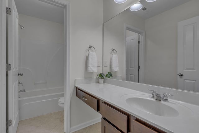 1039 Hemlock Dr, Spring Hill, TN 37174 - full bathroom with vanity, washtub / shower combination, toilet, and tile patterned floors