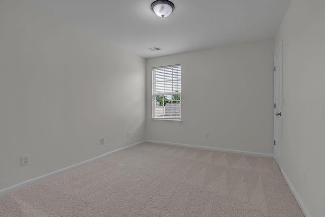 1039 Hemlock Dr, Spring Hill, TN 37174 - empty room with light carpet and baseboards