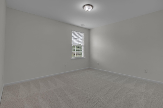 1039 Hemlock Dr, Spring Hill, TN 37174 - empty room featuring light carpet and baseboards