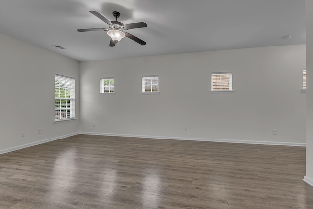1039 Hemlock Dr, Spring Hill, TN 37174 - empty room featuring baseboards, ceiling fan, and dark wood-type flooring