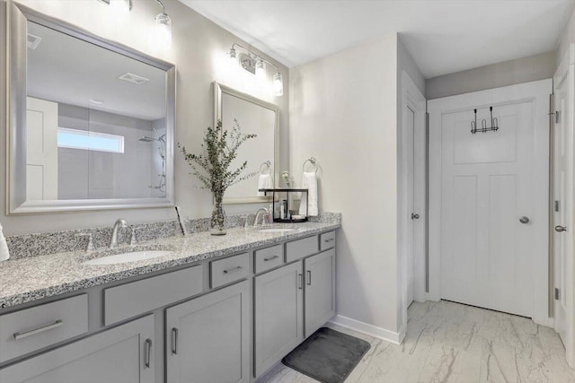 8792 Snowy Owl Rd, Ooltewah, TN 37363 - full bathroom with marble finish floors, double vanity, and a shower