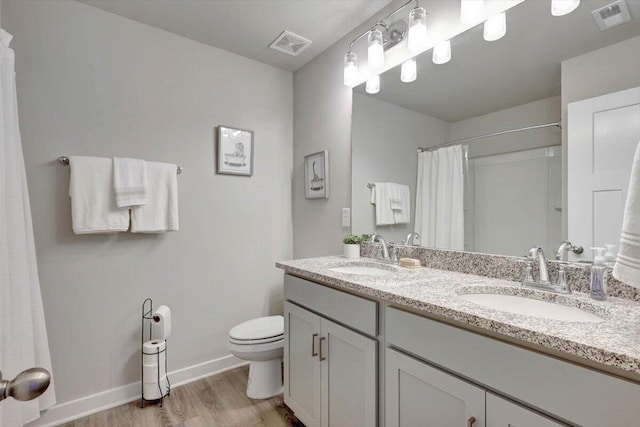 8792 Snowy Owl Rd, Ooltewah, TN 37363 - full bathroom with wood finished floors, double vanity, and curtained shower