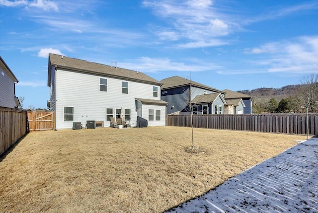 8792 Snowy Owl Rd, Ooltewah, TN 37363 - back of house with a fenced backyard