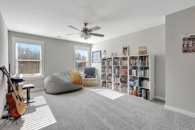 8792 Snowy Owl Rd, Ooltewah, TN 37363 - living area with carpet flooring and ceiling fan