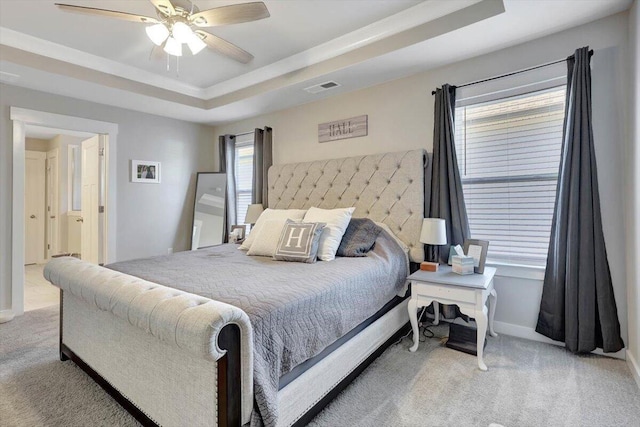 8792 Snowy Owl Rd, Ooltewah, TN 37363 - carpeted bedroom with a raised ceiling and ceiling fan