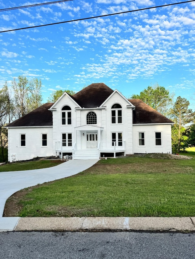 1202 Willow Brook Pass, Mount Juliet, TN 37122 - view of front facade featuring a front yard and roof with shingles
